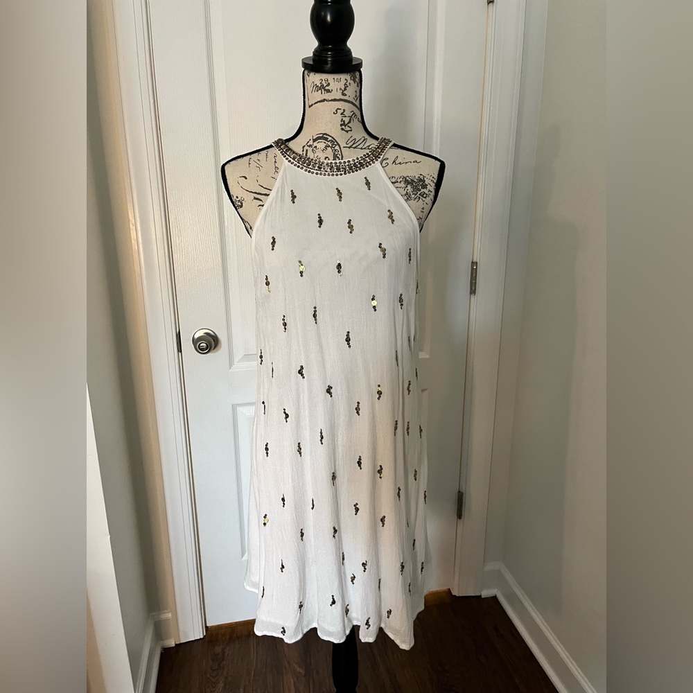 Slightly off White dress with gold accents